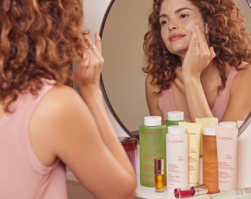 What is the gentlest way to apply a face cleanser?